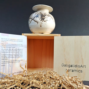 Orange & white with horse's hair & feather

"sfera" unique collection in a wooden box