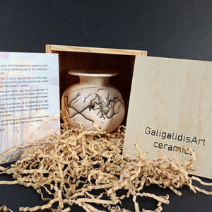 Orange & white with horse's hair & feather

"sfera" unique collection in a wooden box