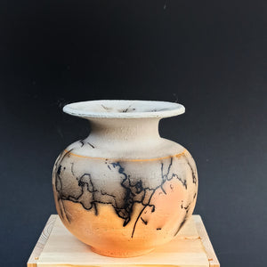 Orange & white with horse's hair & feather

"sfera" unique collection in a wooden box